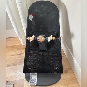 Baby Bjorn bouncer, brand new cover, used once. Comes with play bar